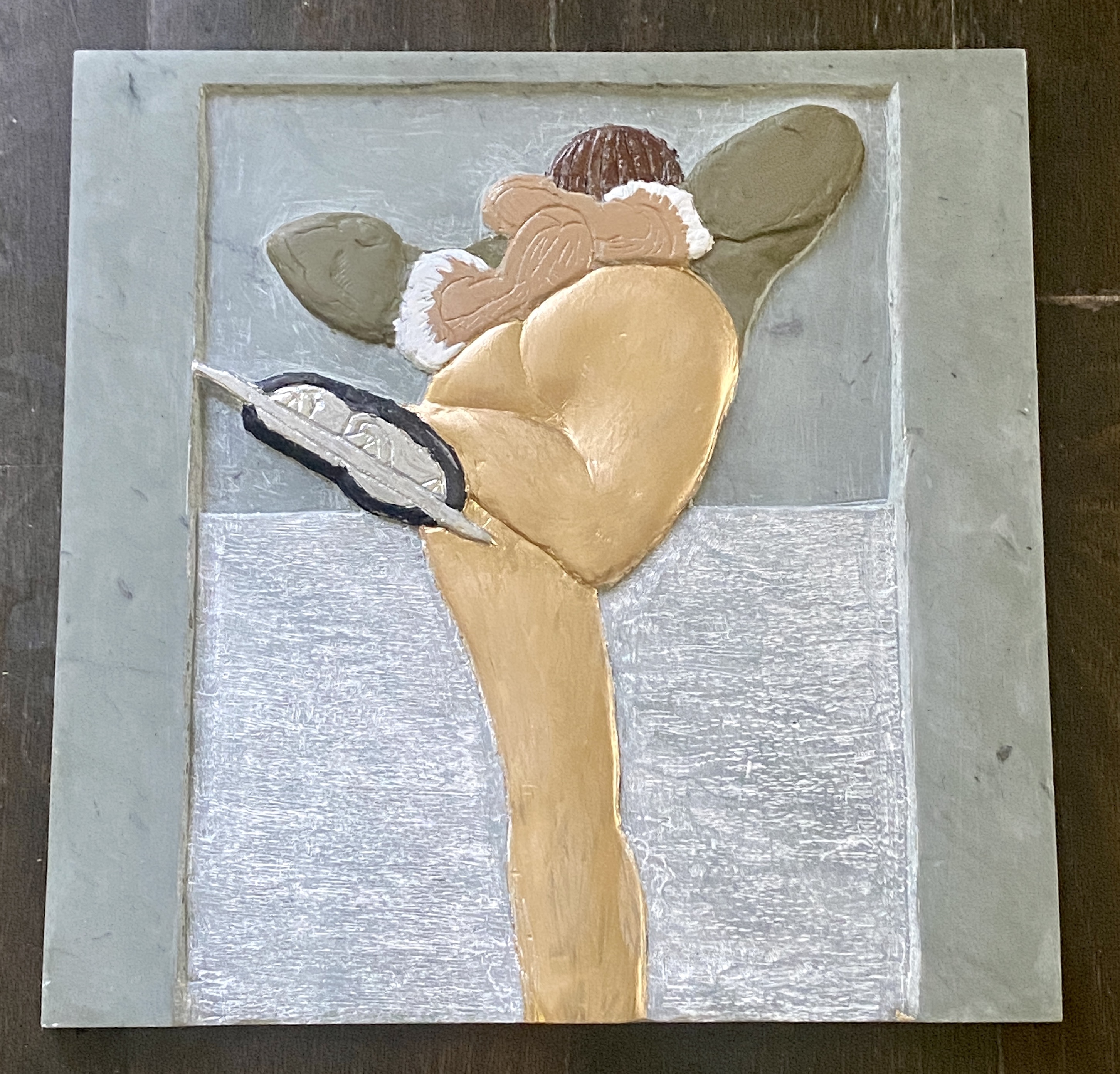 Skater — hand-carved relief in Green VT Slate